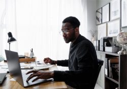 man working in home office